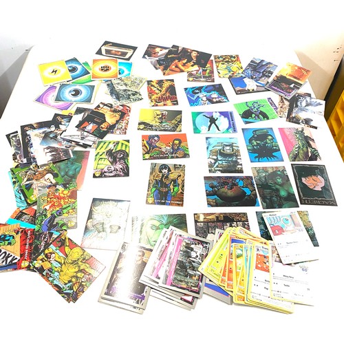 610 - Selection of assorted trading cards to include Pokemon, T2, Judge Dredd etc