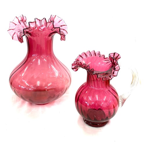 2 - Cranberry glass vase and jug, approximate height of vase: 11.5 inches