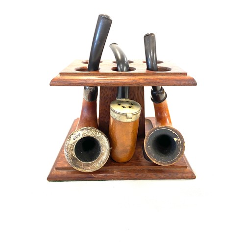 38 - 3 Vintage smoking pipes and stand, one with silver rim