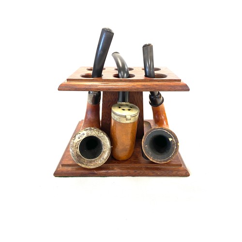 38 - 3 Vintage smoking pipes and stand, one with silver rim