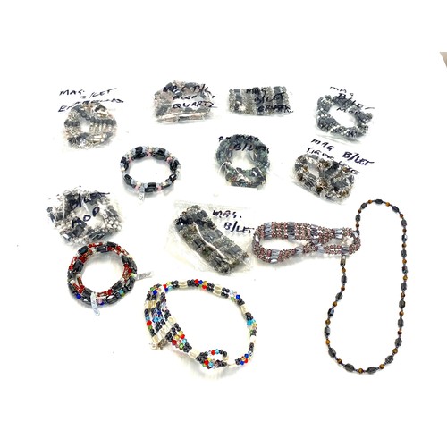 587 - Large selection of ladies magnetic bracelets