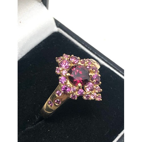 173 - 9ct gold garnet & pink topaz ring weight 3.5g