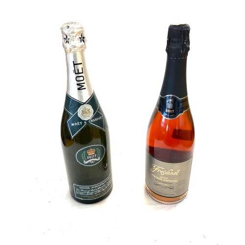 13 - Bottle of sealed Moet and Chandon 1977, The queens silver jubille, Freixenet sealed bottle