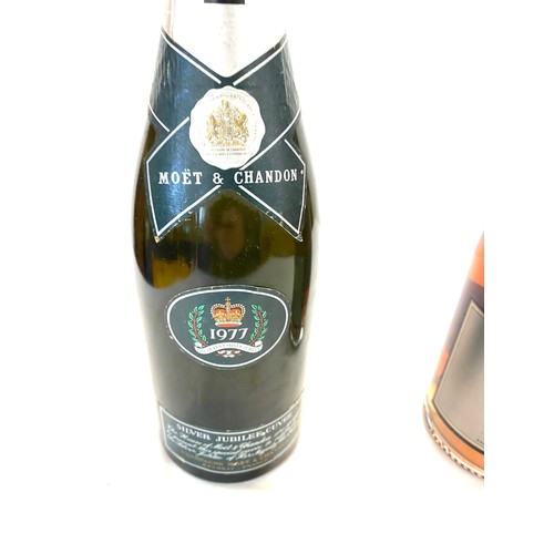 13 - Bottle of sealed Moet and Chandon 1977, The queens silver jubille, Freixenet sealed bottle