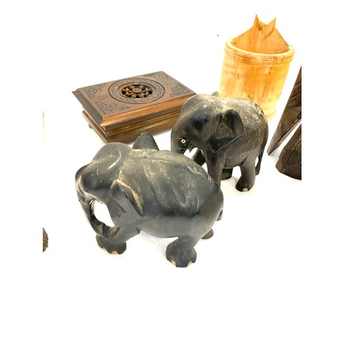 150 - Selection of items to include a carved elephant, stork and other treen