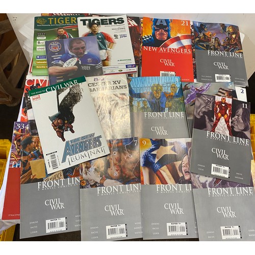 23 - Small quantity of marvel comics and rugby programs