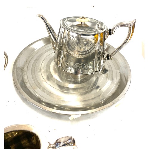 117 - Silver plated tea set to include teapot, milk jug and sugar bowl