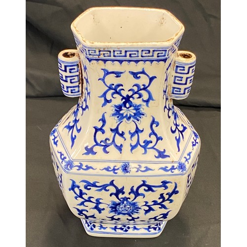 29 - Oriental blue and white vase, no markings to base, approximate height 9 inches