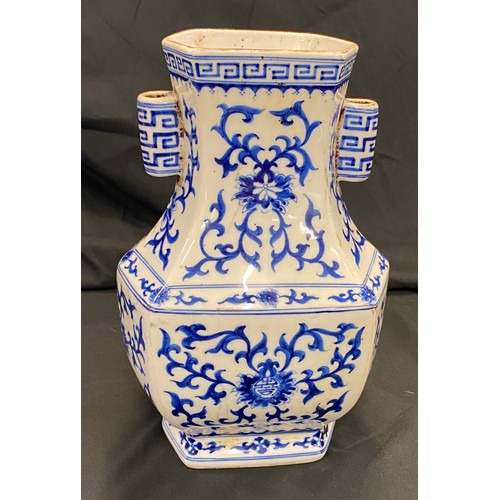 29 - Oriental blue and white vase, no markings to base, approximate height 9 inches