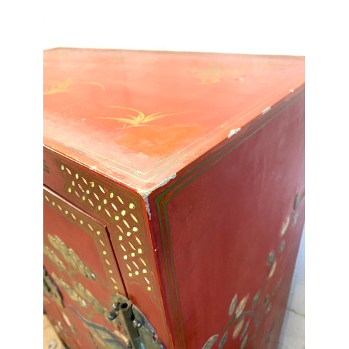 356 - 2 Door red lacquered Chinese inlayed cabinet with 2 internal shelves measures approx 48 inches tall ... 