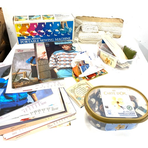 246 - Selection of sewing items to include portable sewing machines, pins, cotton etc and 1980's knitting ... 