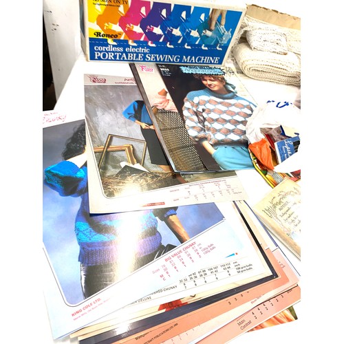 246 - Selection of sewing items to include portable sewing machines, pins, cotton etc and 1980's knitting ... 
