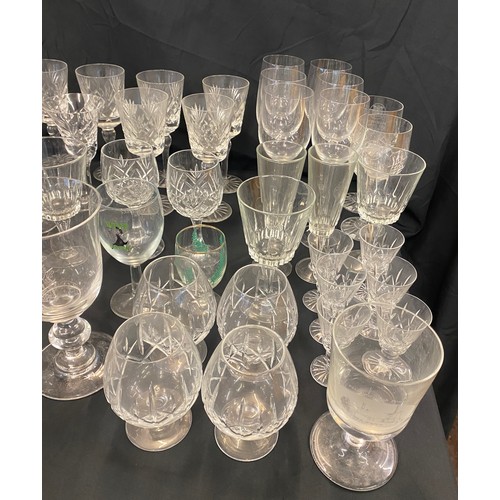 254A - Large selection of assorted glassware includes manchester city glass, bowls etc