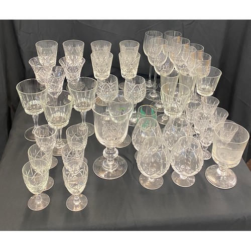 254A - Large selection of assorted glassware includes manchester city glass, bowls etc