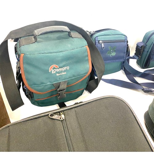 226 - Large selection of assorted travel bags includes lowepro etc