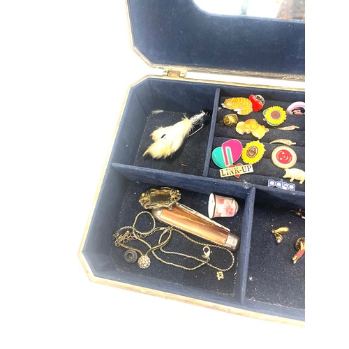 586 - Box of costume jewellery includes silver charm bracelet (some charms not silver), pocket knife, badg... 