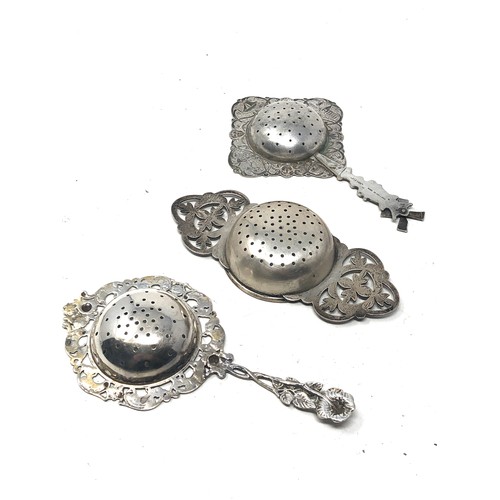 39 - 3 silver tea strainers