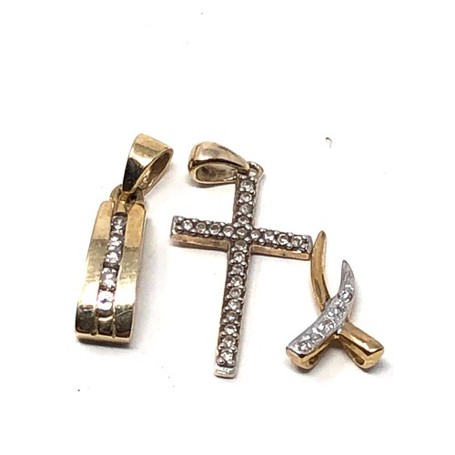 238 - 3 x 9ct gold diamond set pendants inc. cross (1.8g)