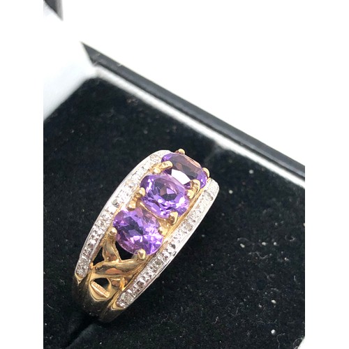 142 - 9ct gold amethyst & diamond ring weight 3.5g