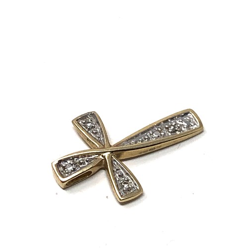 185 - Small 9ct gold diamond cross pendant weight 1g