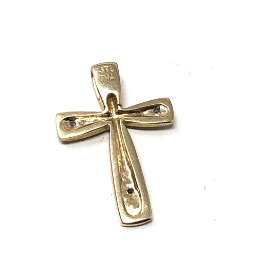 185 - Small 9ct gold diamond cross pendant weight 1g