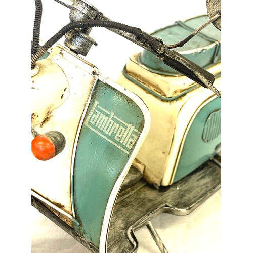 106 - Vintage tin Lambretta scooter model measures height 22cm length 38cm