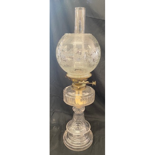 111 - Vintage glass oil lamp, with shade and funnel approximate height: 24 inches, small chip can be seen ... 