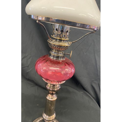 113 - Small silver plated Vintage  cranberry font oil lamp, approximate height 20.5 inches, loose fitting