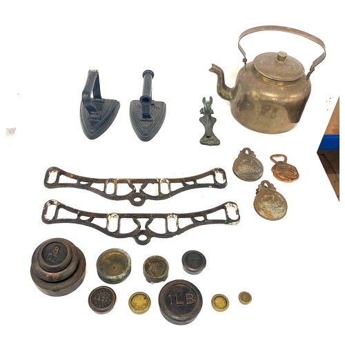 125 - Selection vintage metalware to include a copper kettle, flat irons, door knocker, weights etc