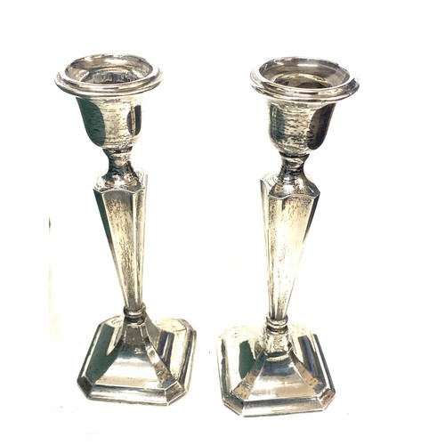 588 - Pair of hallmarked silver candlesticks, Birmingham 1918 markers mark H W Limited, approximate height... 