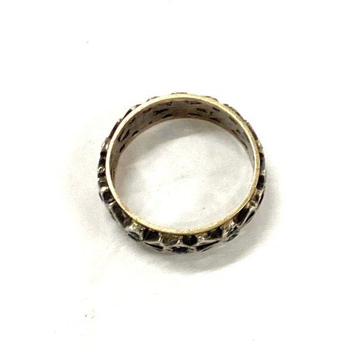 595 - 9ct gold and silver eternity ring set with multi coloured stones, approximate weight 2.1g