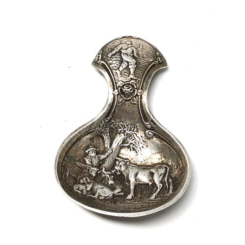 29 - Dutch silver tea caddy spoon embossed scene silver  dutch silver sword hallmark