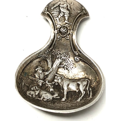 29 - Dutch silver tea caddy spoon embossed scene silver  dutch silver sword hallmark