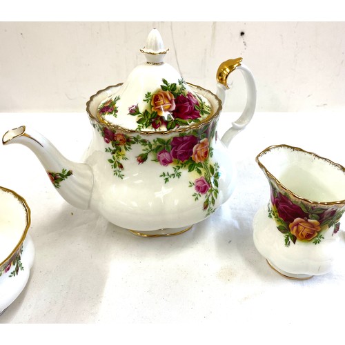 78 - Royal Albert Old country rose teapot, jug and sugar bowl overall good condition small chip on tea po... 