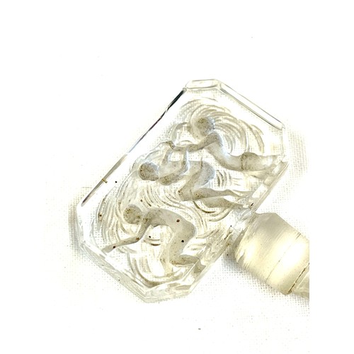 99 - Hoffman Art Deco glass scent bottle stopper, the reverse intaglio octagonal head depicting the Three... 