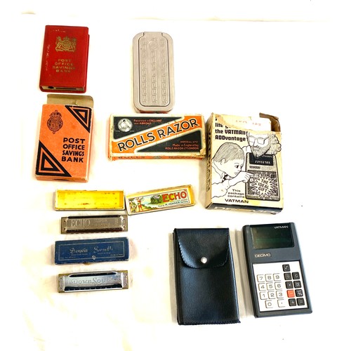 491 - Selection of vintage collectables to include harmonicas, Vatman calculator, Rolls razor etc