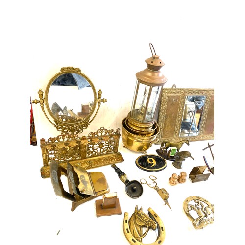 240 - Large selection of brassware to include mirrors, kettle on stand, lantern etc