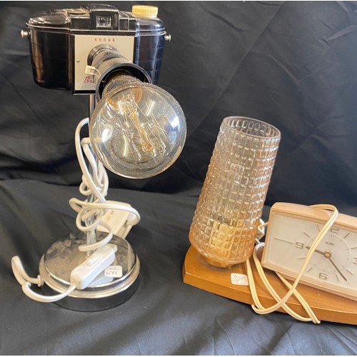 88 - Vintage Metamec bed side alarm clock and lamp and a retro Kodak brownie camera 127, untested