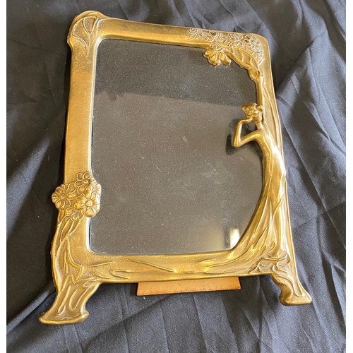 100 - Vintage ornate brass lady picture frame, measures approx 10 inches by 7inches wide