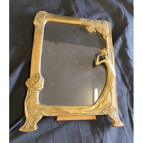 100 - Vintage ornate brass lady picture frame, measures approx 10 inches by 7inches wide