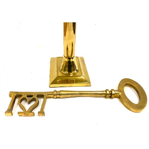 70 - Brass light and a large brass key