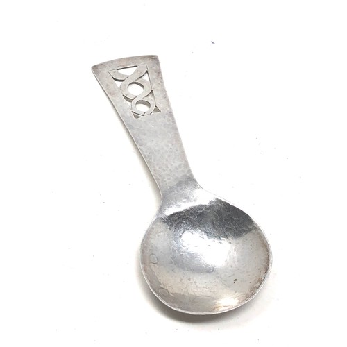 21 - 1934 Arts & crafts silver tea caddy spoon London silver hallmarks measures approx 12.2cm long
Weight... 