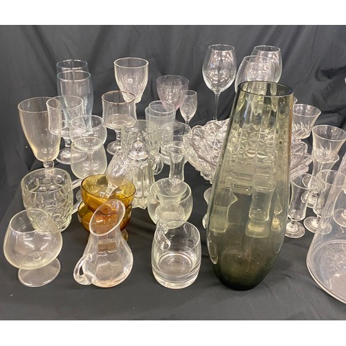 310 - Large selection of glassware includes vases, bowls, wine glasses etc