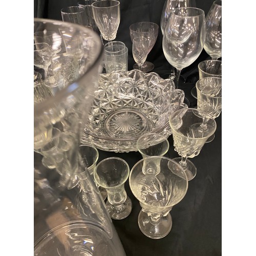 310 - Large selection of glassware includes vases, bowls, wine glasses etc