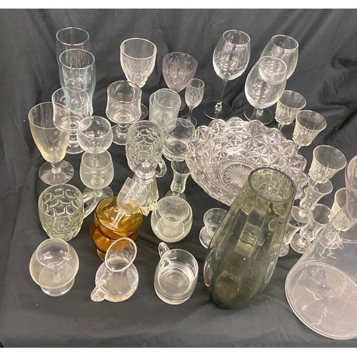 310 - Large selection of glassware includes vases, bowls, wine glasses etc