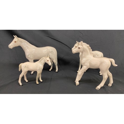 108 - Selection of 4 white Beswick horses