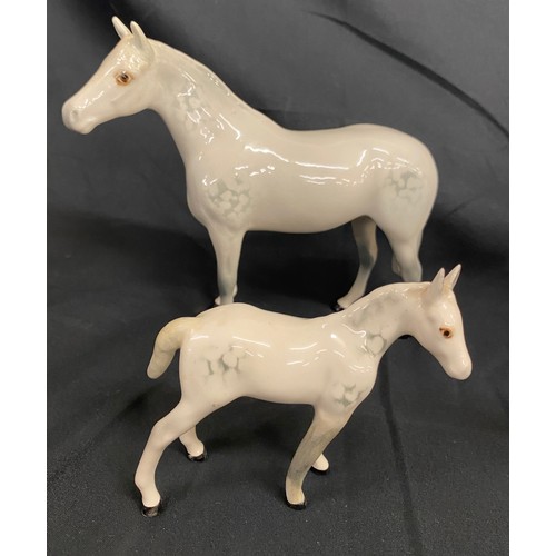 108 - Selection of 4 white Beswick horses