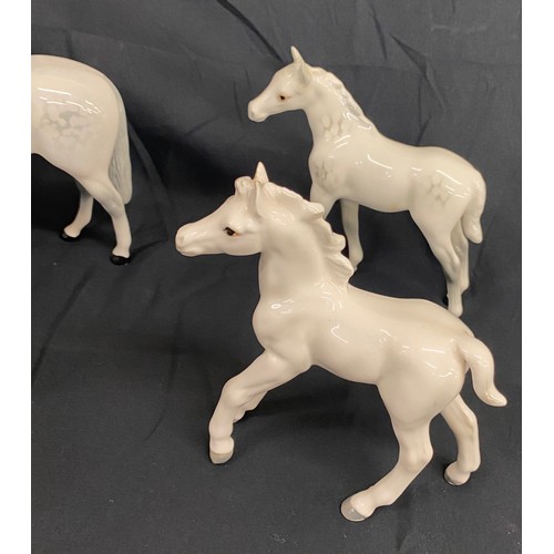 108 - Selection of 4 white Beswick horses