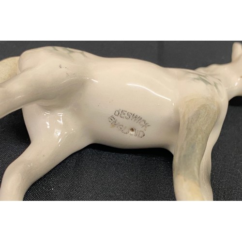 108 - Selection of 4 white Beswick horses