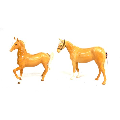 145 - 2 Beswick Palomino horses, over all good condition